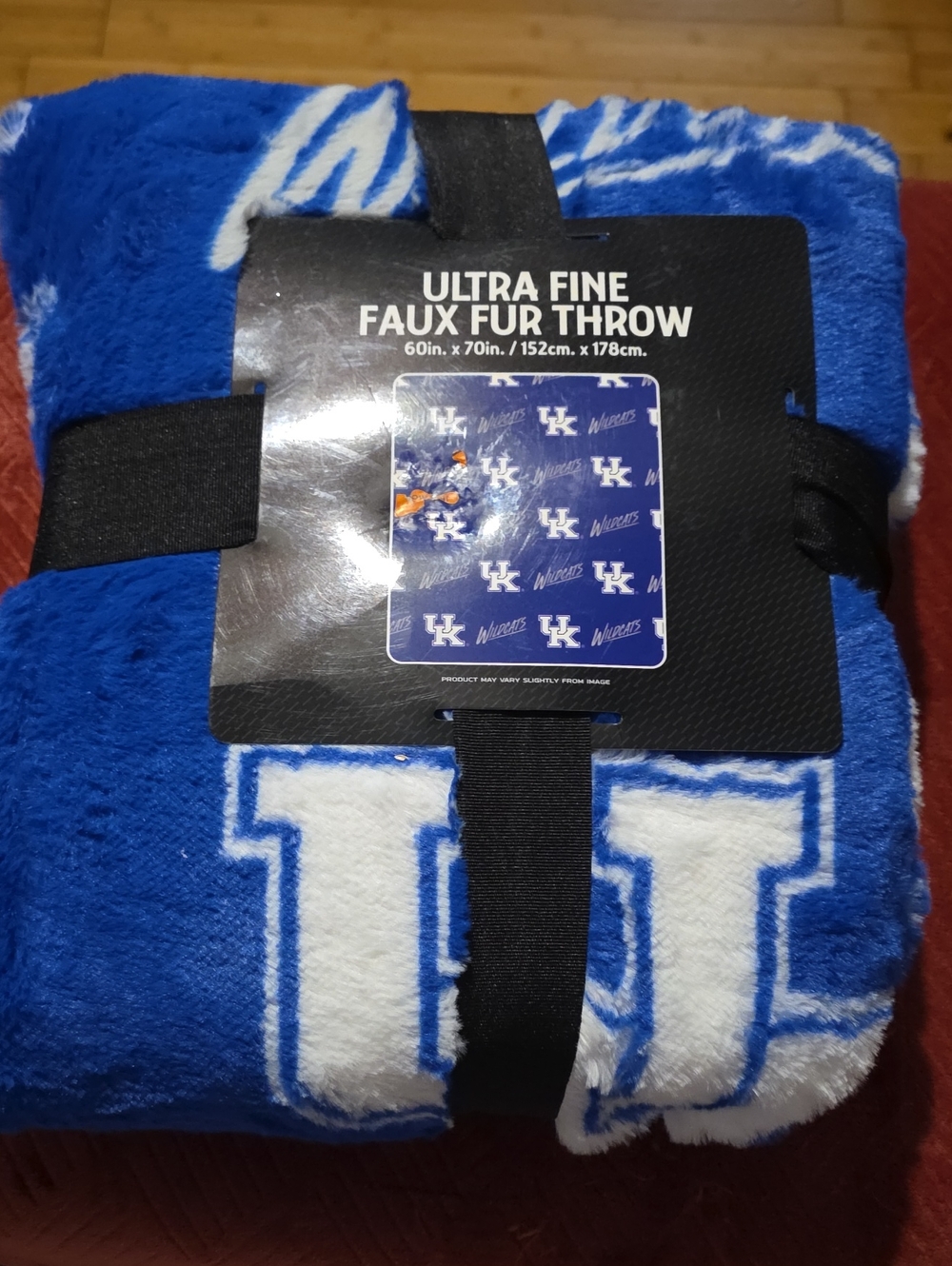 Northwest Royal Blue and White Faux Fur Throw with Team Logo